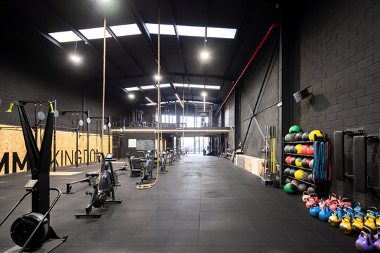 CrossFit gym interior with fitness equipment and kettlebells