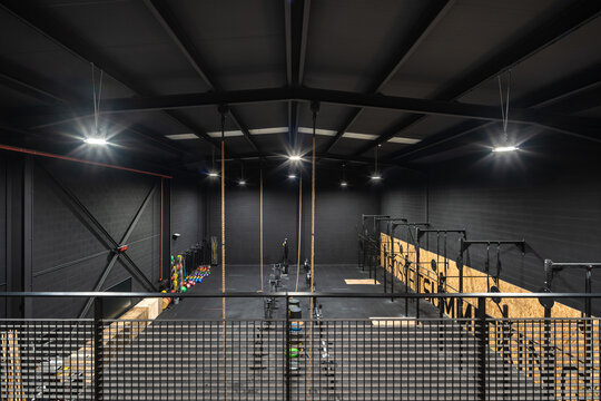 Empty CrossFit gym interior with training equipment
