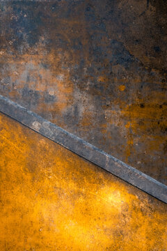 Abstract rusty metal texture with diagonal steel division