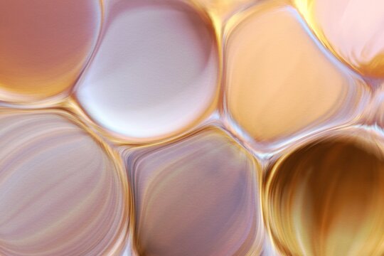 Abstract fluid background with translucent golden organic forms
