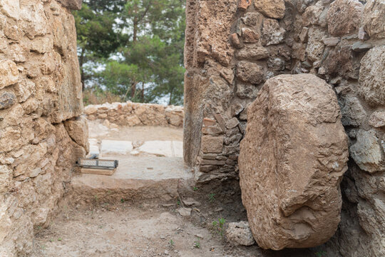 Ancient Stone Ruins with Rolling Stone Door at Archaeological Site