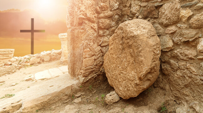 Empty Tomb of Jesus with Rolled Stone and Three Crosses at Sunrise