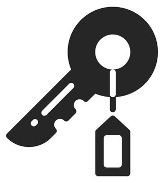 A key with a tag hanging from it