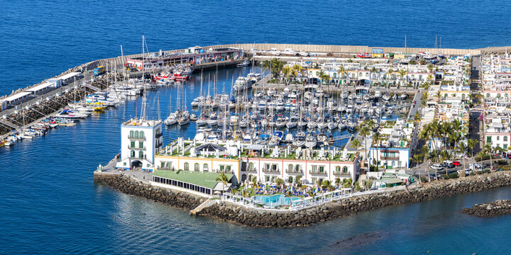 Gran Canaria Puerto de Mogan island from above marina holiday by the sea panorama in Spain