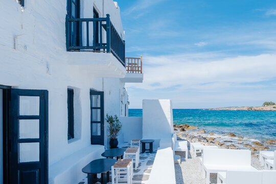 Charming waterfront views of Naousa in Paros, Greece on a sunny day