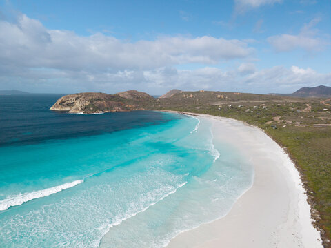 Aerial view of a curved beach and coastal headland on Kangaroo Island
