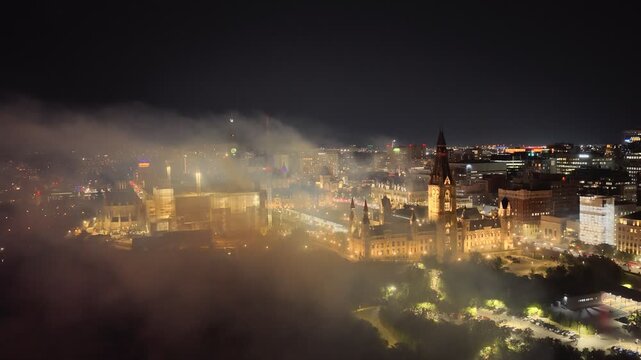Ottawa, Canada, fireworks over Parliament Hill and the Ottawa River amid heavy smoke, haze and air pollution. g.