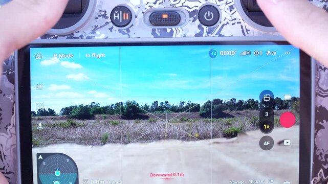 drone controller view, taking off and flying