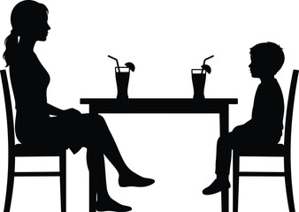 Fototapeta premium Black silhouette of a woman and a child sitting at a table with drinks in a cafe or restaurant