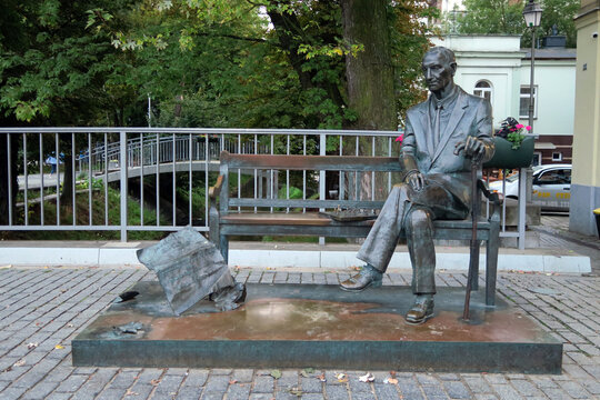 Kielce, Poland.  Jan Karski monument (Polish:Ławeczki Jana Karskiego). The bronze statue, which depicts the World War II hero sitting on a bench, was unveiled in 2015.