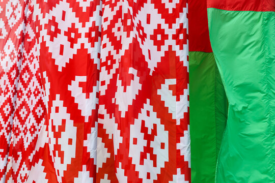 A close-up national flags of Belarus fluttering in the wind.