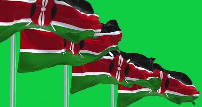 National flags of Kenya waving in the wind isolated on green background