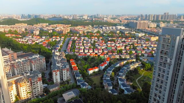 Villas and apartment towers around green space in Guangzhou