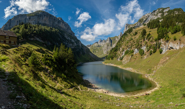 Explore the stunning scenery of Falensee in Appenzell Switzerland, where vibrant greenery meets tranquil waters. Ideal for hiking and a perfect spot for a relaxing holiday or vacation.