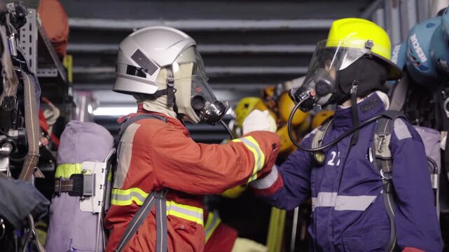 Firefighters giving high five before emergency rescue operation