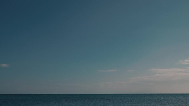 Wide Gradient Blue Sky and Blue Ocean Surface
