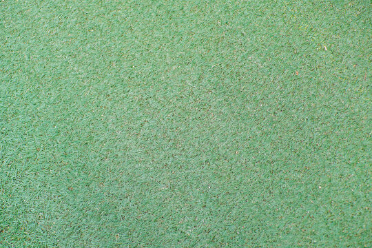 Close up of Green Artificial Grass Texture Background, Synthetic Turf Surface