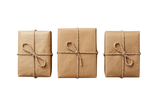 Three kraft parcels tied with twine isolated cutout