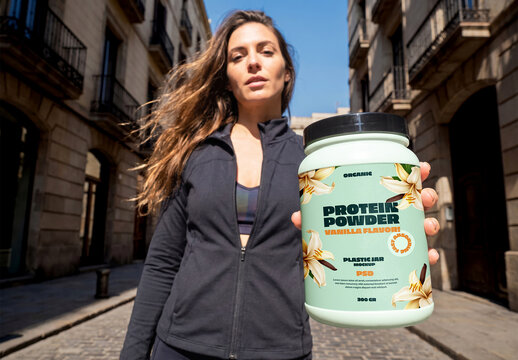 Woman Holding Protein Powder Jar on Street Mockup
