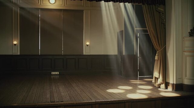 Shifting sunlight through shutters causing wooden stage casting moving circular light spots at hall