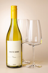 Obraz premium White wine bottle mockup with glass