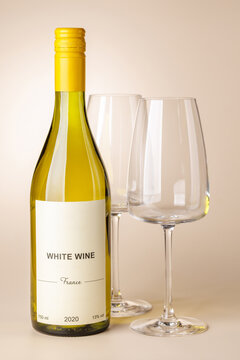 White wine bottle mockup with glass