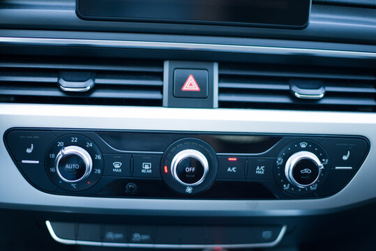 Modern car climate control panel and dashboard