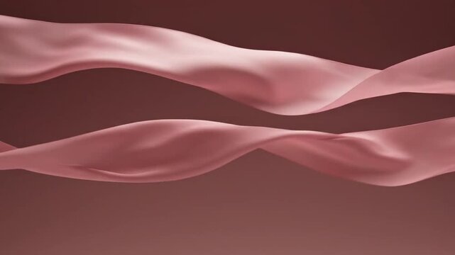 Two smooth flowing pink silk ribbons waving on a soft brown background