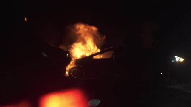 Berridale, New South Wales, Australia - September 29, 2026: Car on fire burning on side of Kosciuszko Road just north of Berridale