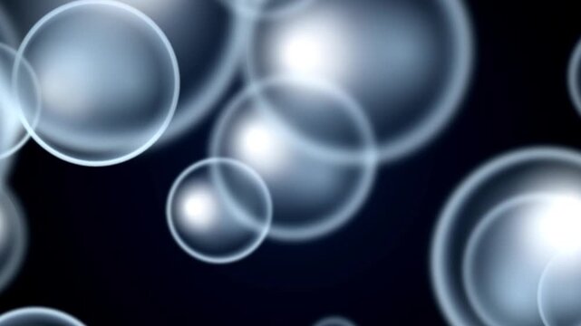 Soft Blue Soap Spheres Floating in Dark with Light Bokeh Background