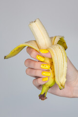 hand holding banana © Екатерина Третьякова