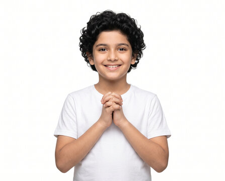 eager young indian school child with clasped hands showing delighted anticipation and joyful smile for education advertising campaign banner