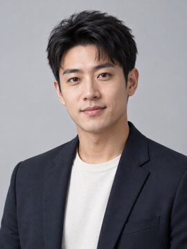 Young man portrait on gray studio background