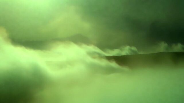 Eerie green fog rolling over a dark, mysterious, and spooky landscape with a moody and unsettling atmosphere
