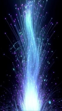 Luminous blue fiber optic strands and glowing particles emerging on a dark background in a dynamic abstract animation