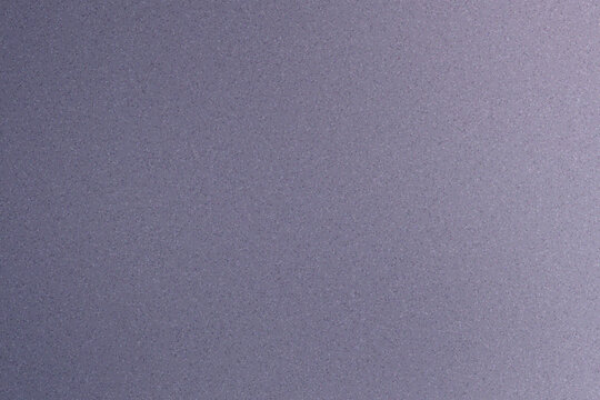 Abstract lilac and purple color field with soft gradient, coarse grain, granular noise, blurred texture, and diffuse atmospheric surface