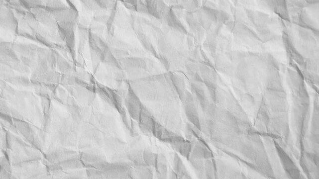 Animated white crumpled paper texture with folds, wrinkles, creases and soft shadows. Clean tactile paper background loop for video editing, motion graphics, overlays, transitions and creative design.