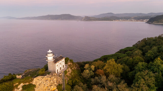 Getaria lighthouse standing on Basque Country cliff