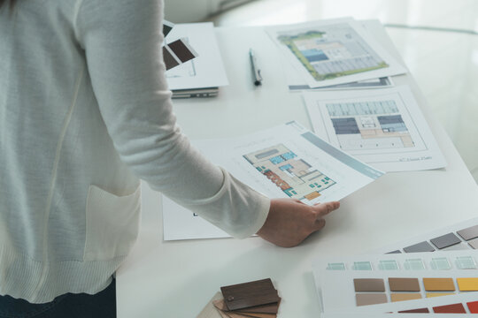 Architect could develop a concept for the design house in modern office.
