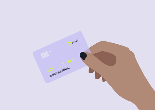 A hand displays a transparent bank card, highlighting its sleek design and banking features, The setting emphasizes financial technology and accessibility in everyday life.