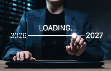 New year transition from 2026 to 2027 shown with digital loading progress, representing future planning, business goals, technology change, countdown, transformation, growth, upcoming opportunities © Sandwish
