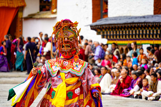 Drubchen festival, Dromchoe festival, mask dancing, Tashichho Dzong, Thimphu Dzong, Traditional masked dancer in colorful costume performing at cultural festival, Thimphu, Bhutan, SEP 2026