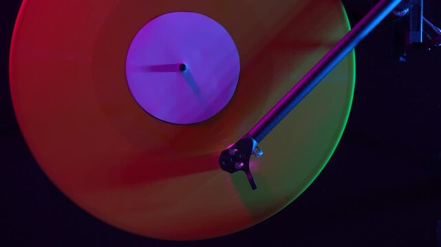 Close-up of a vinyl record playing on a turntable