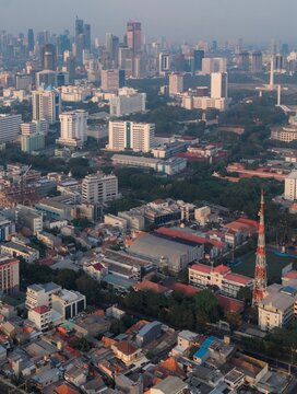 Aerial view of Jakarta city skyline with National Monument Monas and modern architecture
