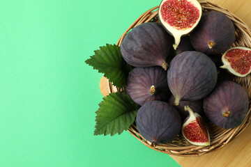 Fresh autumn figs on a colored background.  © Pixora ST 