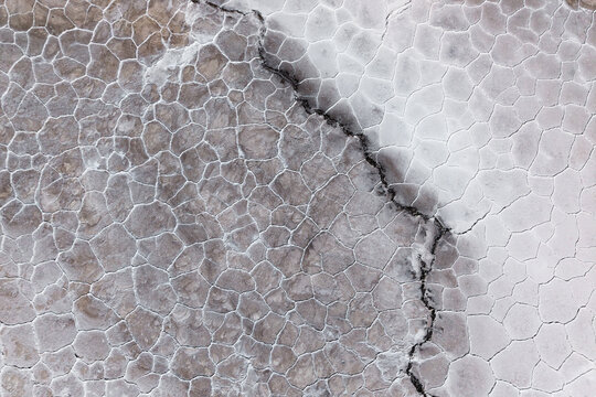 Salt flat texture with natural saline crack pattern