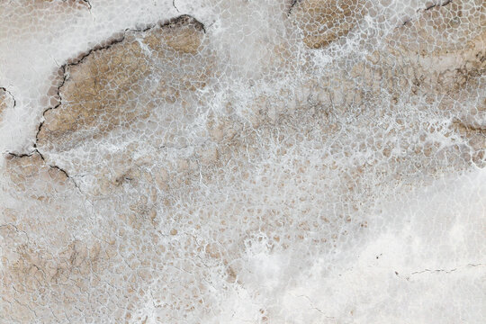 Natural salt flat texture with saline geological pattern