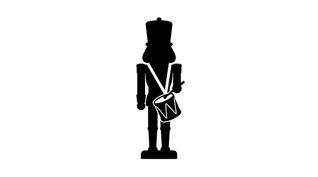 Silhouette of a drummer nutcracker soldier with a drum and stick