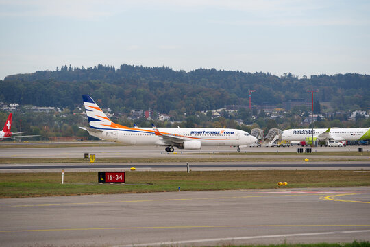 Smartwings airplane type Boeing 737-8Q8 registration OK-TVJ arriving at Swiss Z&uuml;rich Airport on an autumn afternoon. Photo taken September 29th, 2026, Zurich Airport, Switzerland.
