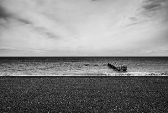 Monochrome seascape with Ponton du Lido in Nice, France